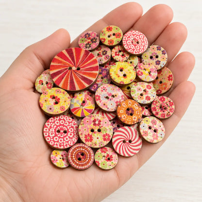 Mixed-pattern wooden buttons in several sizes held in an open palm