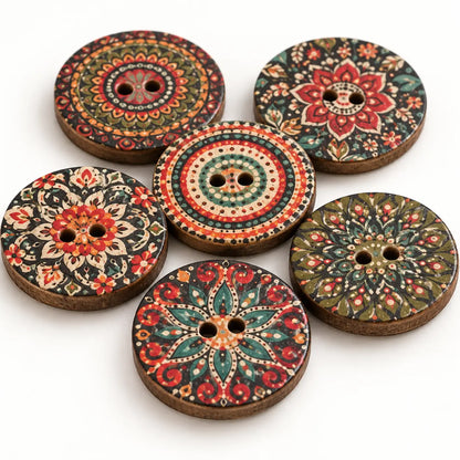 Macro view of 20 mm painted wooden buttons showing intricate patterns and two-hole construction