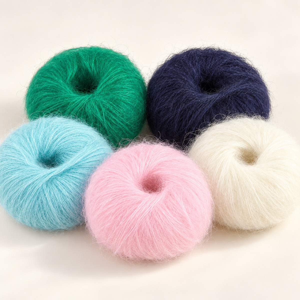 All five 25 g fluffy mohair-blend yarn colours; one ball included per selected variant