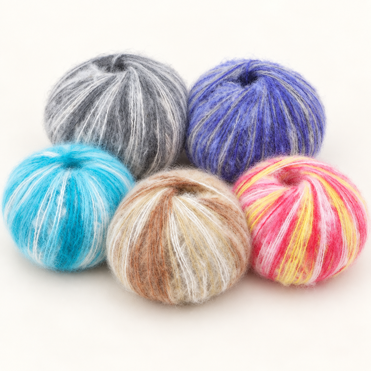 All five 25 g variegated mohair-blend yarn colours; one ball included per selected variant