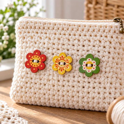 Painted flower wooden buttons sewn onto a cream crochet pouch; pouch not included