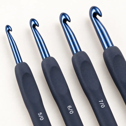 Dark-blue soft-grip crochet hook heads and handle detail