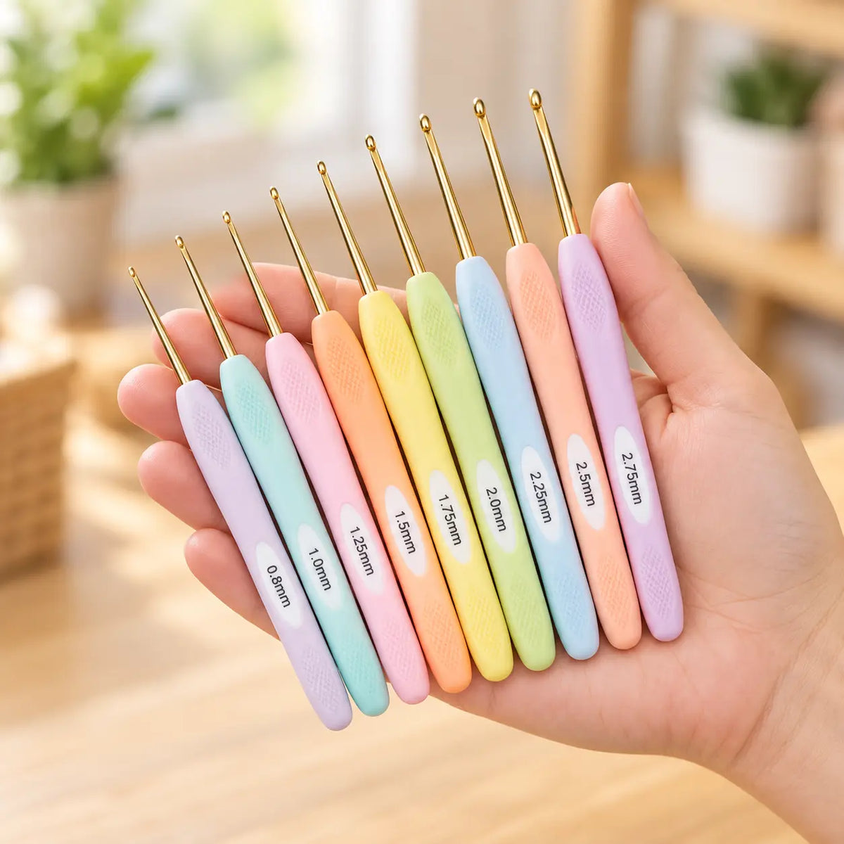 Complete 9-piece Fine soft-grip crochet hook set shown at hand scale