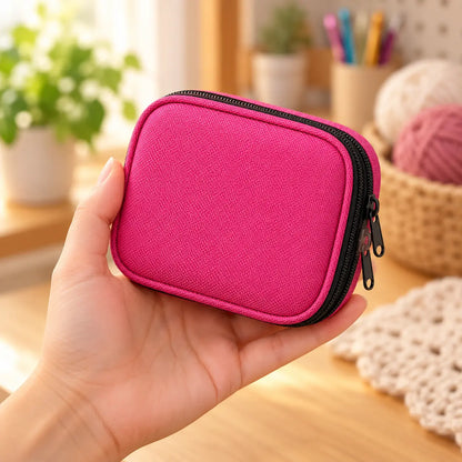 Closed Rose Pink complete crochet tool kit case shown at hand scale