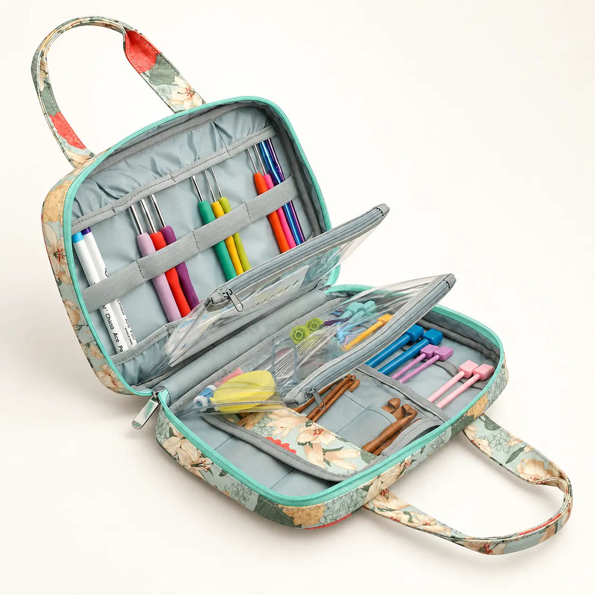 Floral crochet hook organizer case open with tools shown for demonstration; tools not included