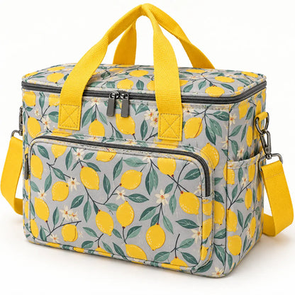 Lemon-print yarn storage tote zipper, handle, pocket and strap detail