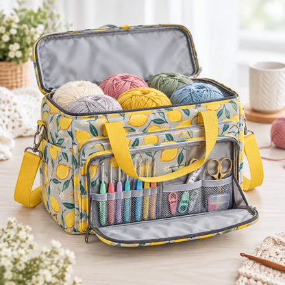 Large lemon-print yarn storage tote open with yarn and tools for demonstration; accessories not included