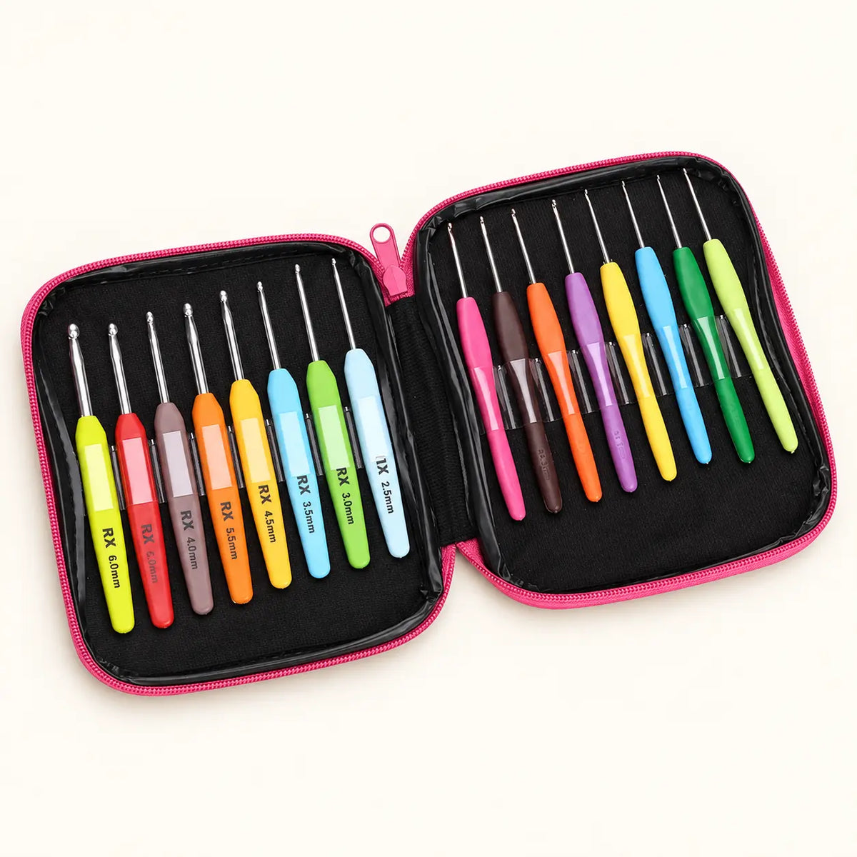 Sixteen-piece soft-grip crochet hook set inside a pink-trimmed black carry case